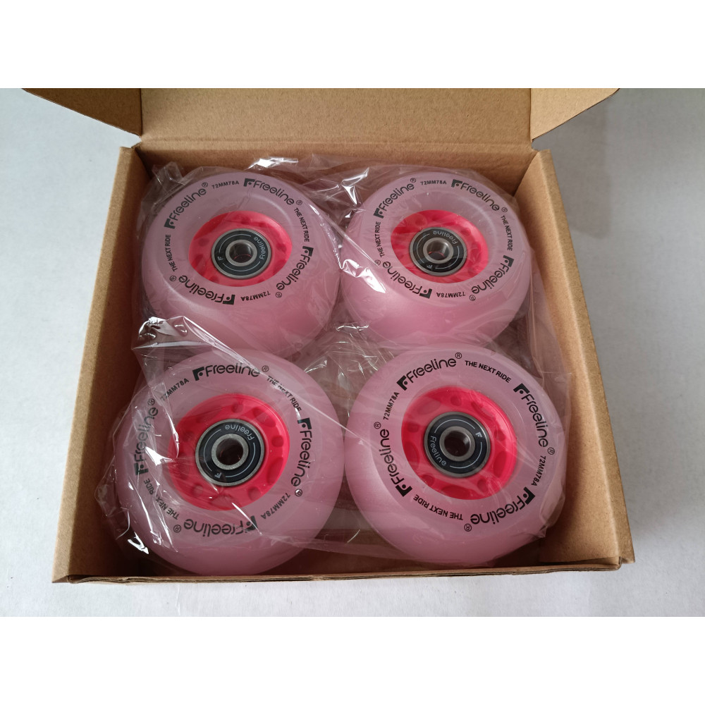 Caja de cuatro ruedas luminosas de freeskate de la marca freeline skates de color rojo nuevas.