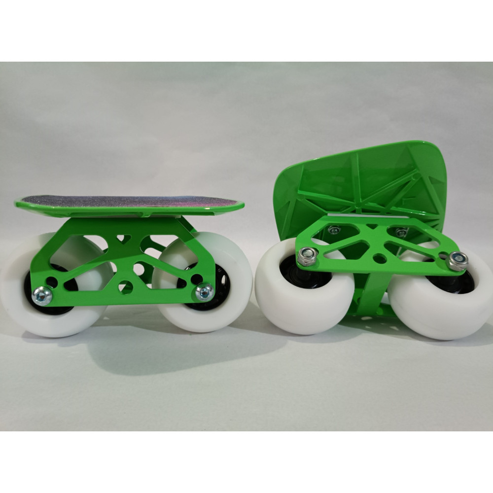 Shift Drift Skate verde con base curva y ruedas blancas.